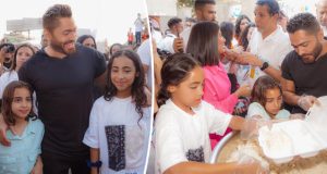 تامر حسني يرسم البسمة على وجوه المحتاجين.. حضّر مع ابنتيه وجبات لـ٧ آلاف شخص
